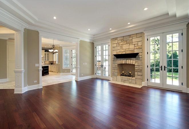 wide-angle shot of hardwood floors in a spacious hallway